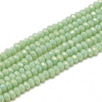 Approx 200, 1.5 x 2.5mm Faceted crystals Opaque Light Green AB
