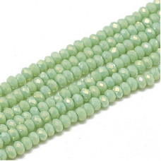 Approx 200, 1.5 x 2.5mm Faceted crystals Opaque Light Green AB